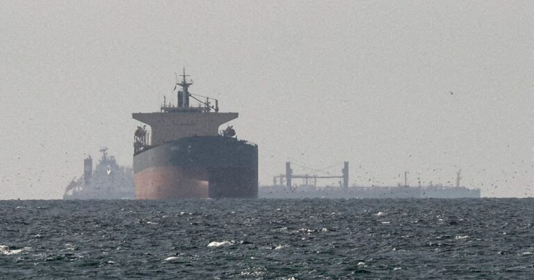 A Missile Strike Over a Merchant Ship