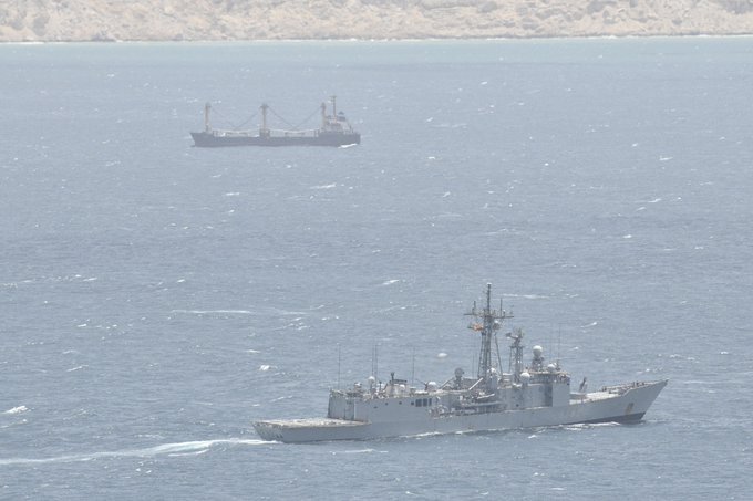 warship monitoring hijacked cargo ship