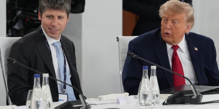 OpenAI CEO Sam Altman (left) with President Donald Trump in June