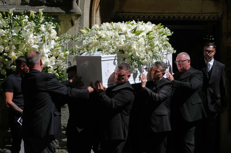 The coffin is taken from Swansea Minster following the funeral of Bonnie Tyler in Swansea, Wales, Monday, Aug. 17, 2026. (AP