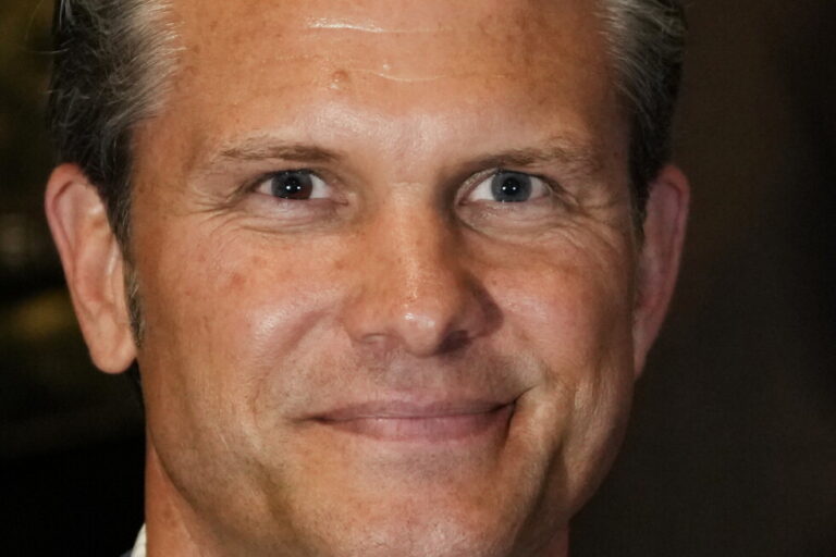U.S. Defense Secretary Pete Hegseth smiles during a forum of The Americas Counter Cartel Coalition in Panama City