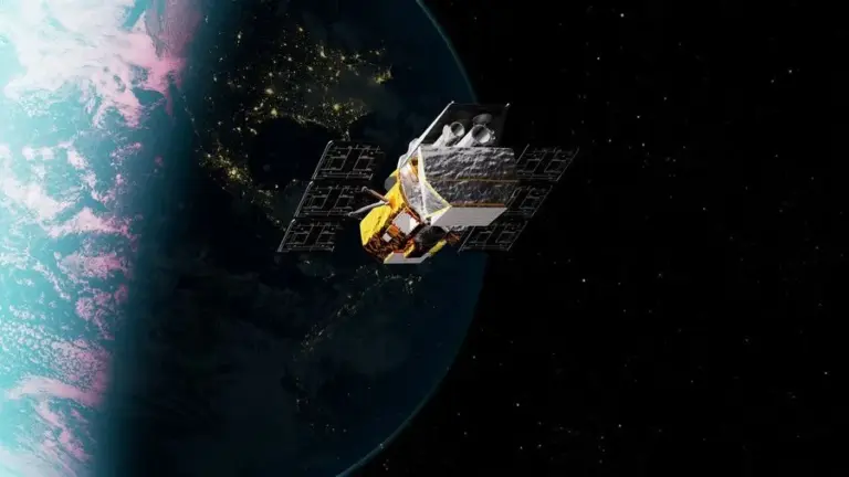 NASA’s Neil Gehrels Swift Observatory, shown in this artist’s concept, has orbited Earth for more than 20 years, studying