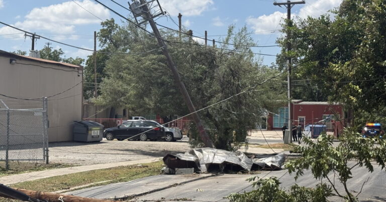 Storm damage at Flores and Cypress streets in San Antonio, where high winds brought down utility poles, power lines and tree