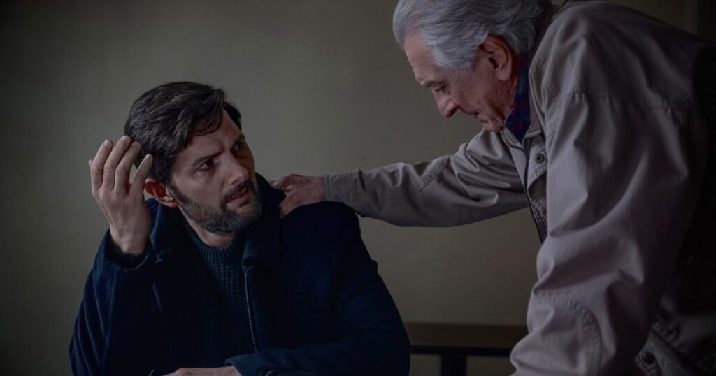 The Whisper Man. (L-R) Adam Scott as Tom Kennedy and Robert De Niro as Peter Willis in The Whisper Man. Cr. David