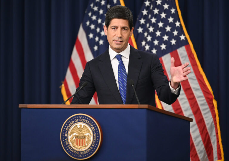 Three words from Kevin Warsh have Wall Street wondering how far the Fed will go with rate hikes