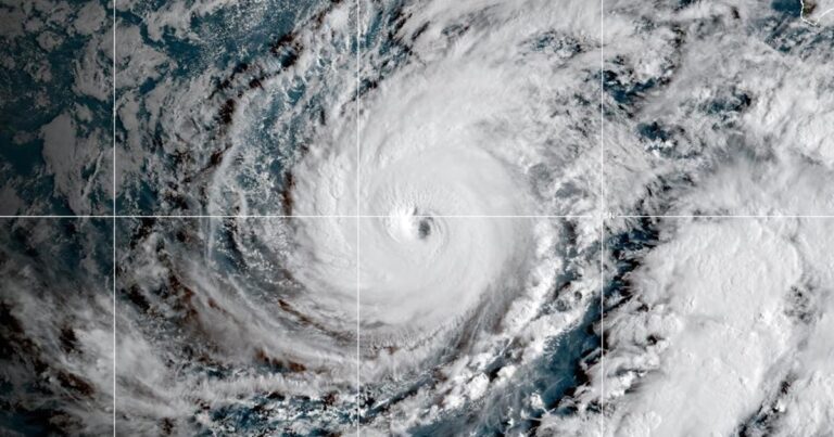 Hurricane Lowell nears Hawaii, prompting warnings for 3 islands