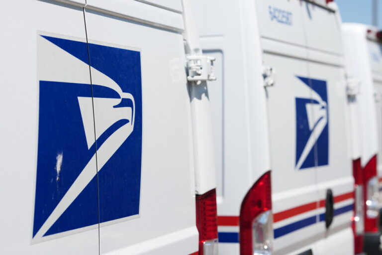 Delivery vans are parked during a protest staged as part of a countrywide National Day of Action Tuesday, July 28, 2026