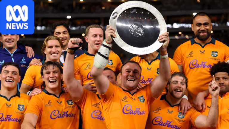 Harry Wilson and the Wallabies hold aloft the Mandela Challenge Plate