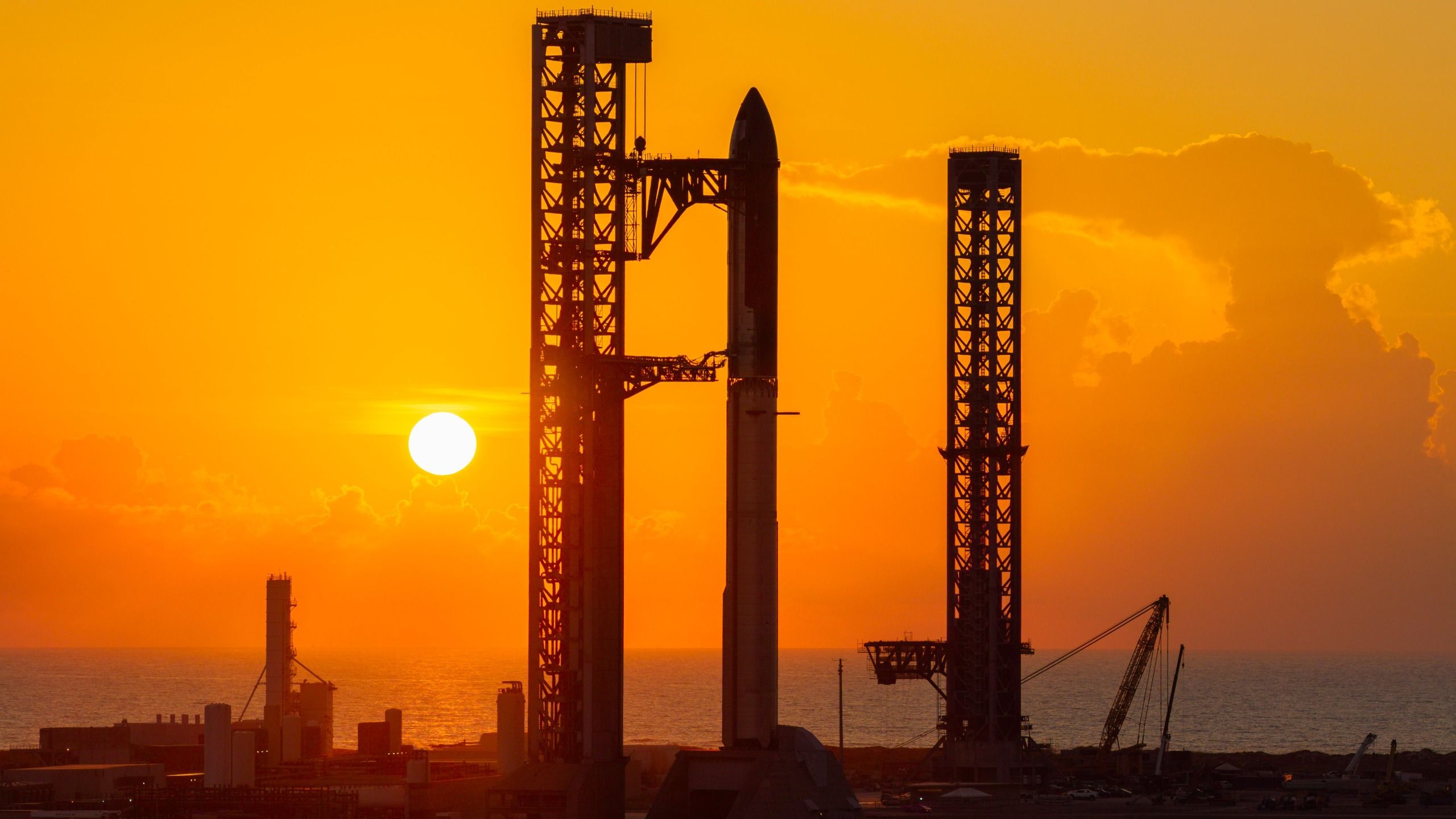 A towering SpaceX Starship rocket stands at Starbase