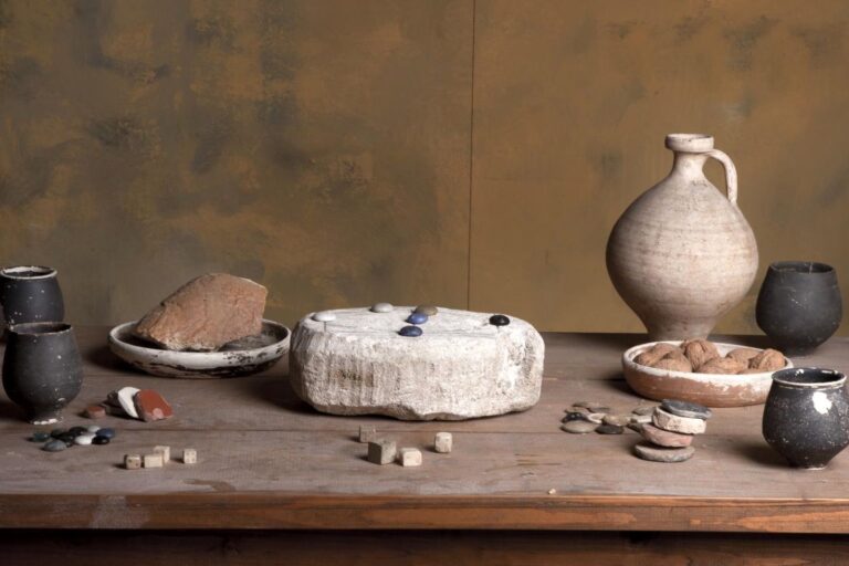 The Roman stone pictured with pieces that were not found with the artifact