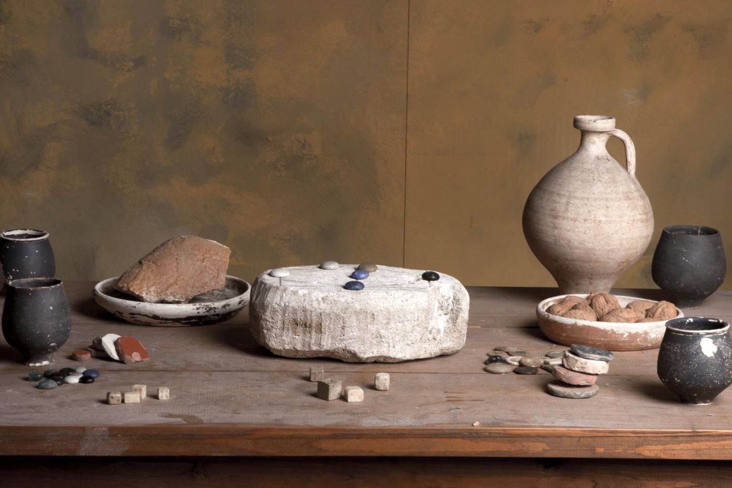 The Roman stone pictured with pieces that were not found with the artifact