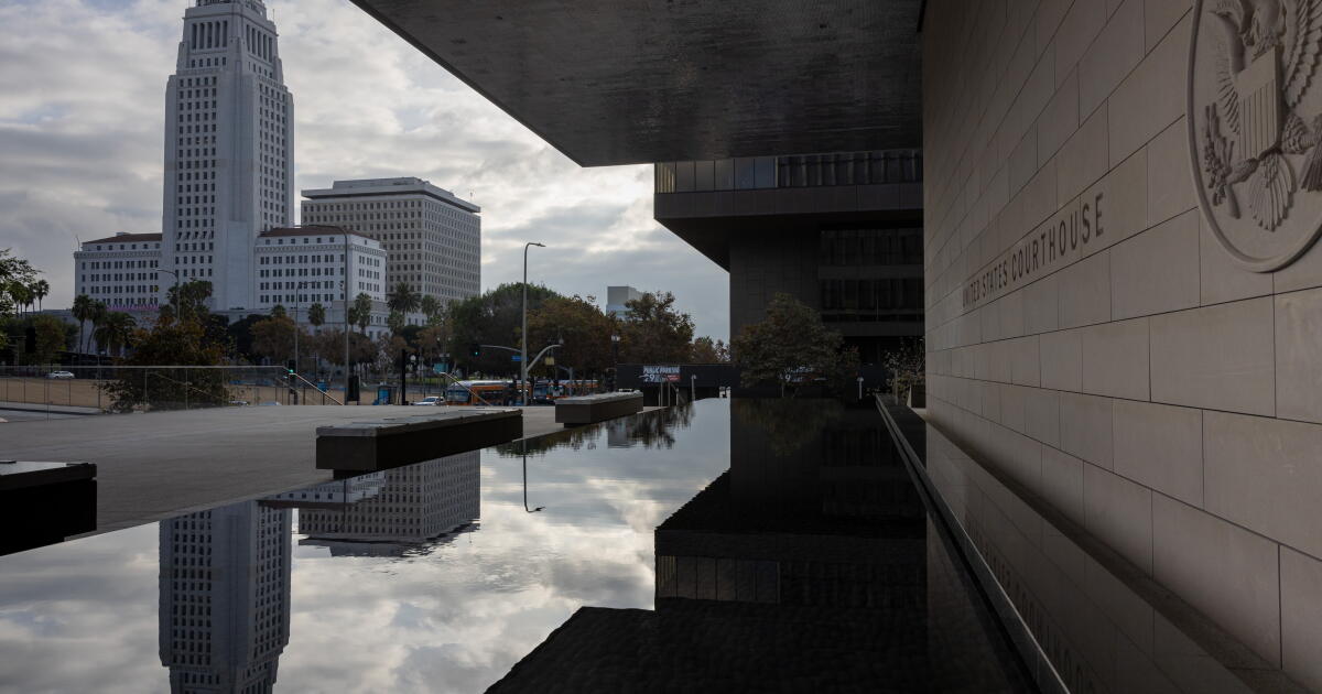 Los Angeles, CA - November 07: A view of City Hall and its reflection, from the United States Courthouse, also known as the