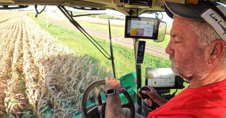 Farmer Jason Kurtz harvests corn Tuesday, Sept. 8, 2026, near Forest City, Mo. (AP Photo/Nick Ingram)