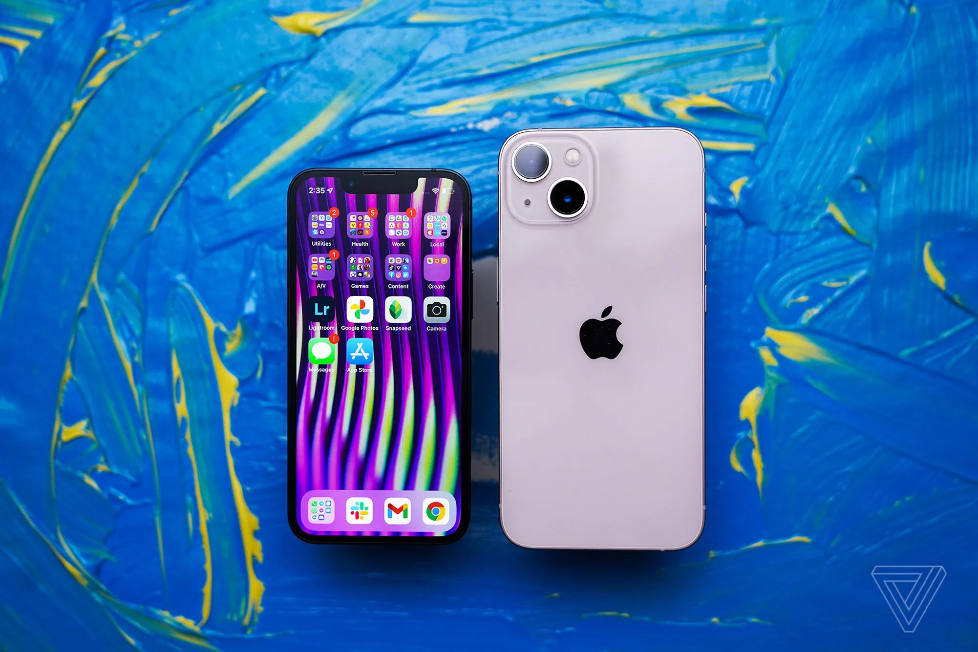 iPhone 13 Mini on the left and iPhone 13 on the right