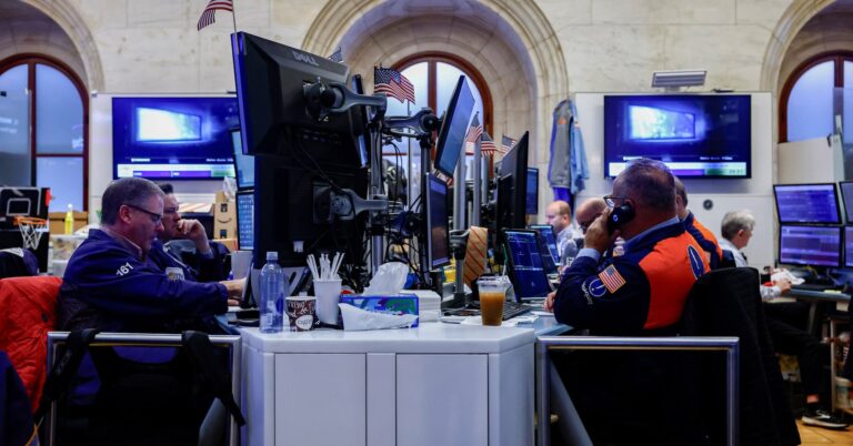Traders work on the floor at the New York Stock Exchange (NYSE) in New York City, U.S., September 29, 2026. REUTERS/Jeenah
