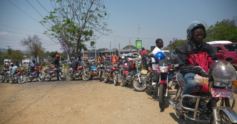 Motorbike riders line up to buy fuel after crippling fuel shortages resurfaced, with some residents spending the night at
